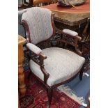 A pair of Victorian armchairs