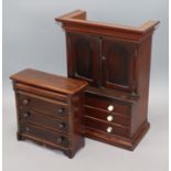 A Victorian mahogany miniature bookcase cabinet and similar chest of drawers