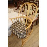 An Ercol elm and beech rocking chair