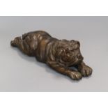 A bronze of a sleeping bulldog puppy length 37cm
