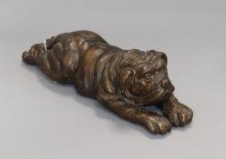 A bronze of a sleeping bulldog puppy length 37cm