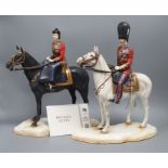 A pair of Michael Sutty models of The Queen and Prince Philip trooping the colour for the silver