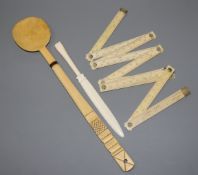A six section folding ruler and two other pieces of ivory and bone