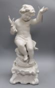 A German bisque figure of a cherub height 61cm