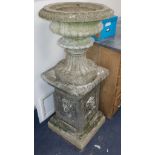 A small reconstituted stone urn on pedestal H.132cm