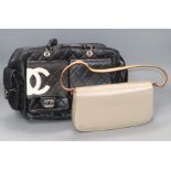 A Louis Vuitton glace leather hand bag and a Chanel handbag