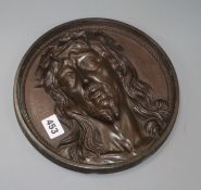 A bronze roundel of Christ