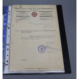 Folder containing original citations for infantry assault badge, citations for close combat clasp,