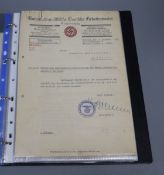 Folder containing original citations for infantry assault badge, citations for close combat clasp,