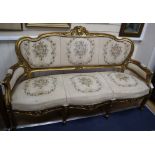 A Louis XV style gilt carved wood settee, on cabriole legs W.173cm