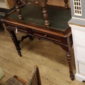A rosewood writing table W.111cm