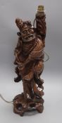 A Chinese carved hardwood figural carving height 48cm