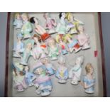 Twenty pin dollies and three Minton 'satsuma' plates