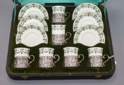A George Jones & Sons porcelain set of coffee cans and saucers, silver mounted and cased