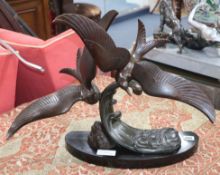 A spelter Art Deco figure group of two sea birds height 42cm
