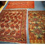 A Caucasian rug, one other and a rug remnant (3) 164 x 98cm, 172 x 137 and 154 x 85cm