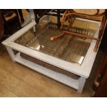 A large painted coffee table with basket W.125cm