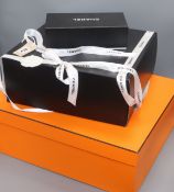 A quantity of Hermes and Chanel boxes