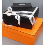 A quantity of Hermes and Chanel boxes