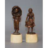 A pair of small bronzes of children tallest 16cm