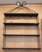 A wood and iron four shelf bracket W.70cm