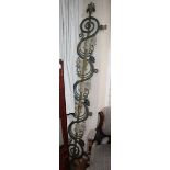 A cast iron Victorian gate pediment, decorated with vine leaves and bunches of grapes W.225cm