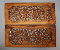 A set of four Chinese carved wood panels