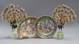 Two 19th century famille rose dishes and a pair of gilt metal and enamel peacock figures