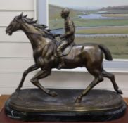 After Bonheur. A bronze horse and jockey, on marble base height 50cm