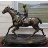 After Bonheur. A bronze horse and jockey, on marble base height 50cm