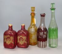 Five coloured glass decanters, a Mary Gregory vase and two cups