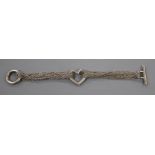 A Tiffany & Co sterling mesh chain link bracelet with central heart motif, 18cm.