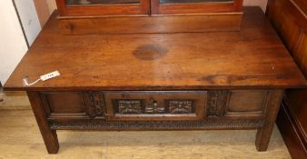 A Spanish walnut low table W.117cm