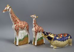 Three Royal Crown Derby paperweights, Masai Giraffe and Masai Baby Giraffe, signature edition 950