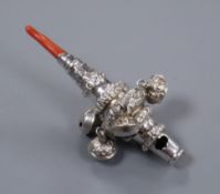 A Victorian silver child's rattle, with whistle, five bells and coral teether, Hilliard &