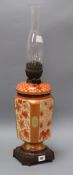 A late Victorian Oriental style pottery oil lamp H.66cm