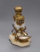 A French 19th century 'Palais Royal' style gilt brass and white opaline glass eau de toilette stand,