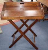 A 19th century mahogany butler's tray and stand W.74cm