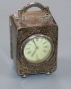 A George V silver carriage timepiece by Asprey & Co, London, 1918, 9.7cm including handle.