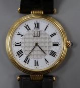 A gentleman's 18ct gold Dunhill automatic dress wrist watch, on a Dunhill leather strap, movement