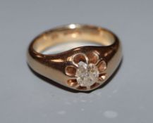 A 9ct gold and claw set solitaire diamond ring, size R.