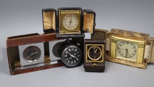 Cased Zenith timepiece, two cased Art Deco timepieces, a Doxa 8-day folding clock and a Smiths