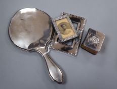 An Edwardian silver mounted small photograph frame, Birmingham, 1903 and three other silver items