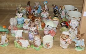 A quantity of Beatrix Potter figures, Royal Albert and Beswick with two Royal Doulton mugs and a