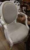 A Louis XV style white painted elbow chair