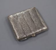 A 1950's Finnish 813 white metal cigarette case with samorodok decoration, 95mm.