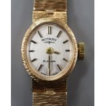 A lady's Rotary 9ct gold wristwatch on textured bracelet.