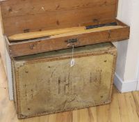 A vintage cricket set and suitcase