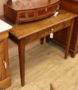 An oak side table W.99cm