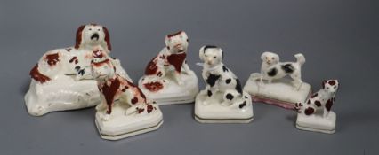 Six Staffordshire porcelain figures of King Charles Spaniels, c.1830-50, including a pair seated and